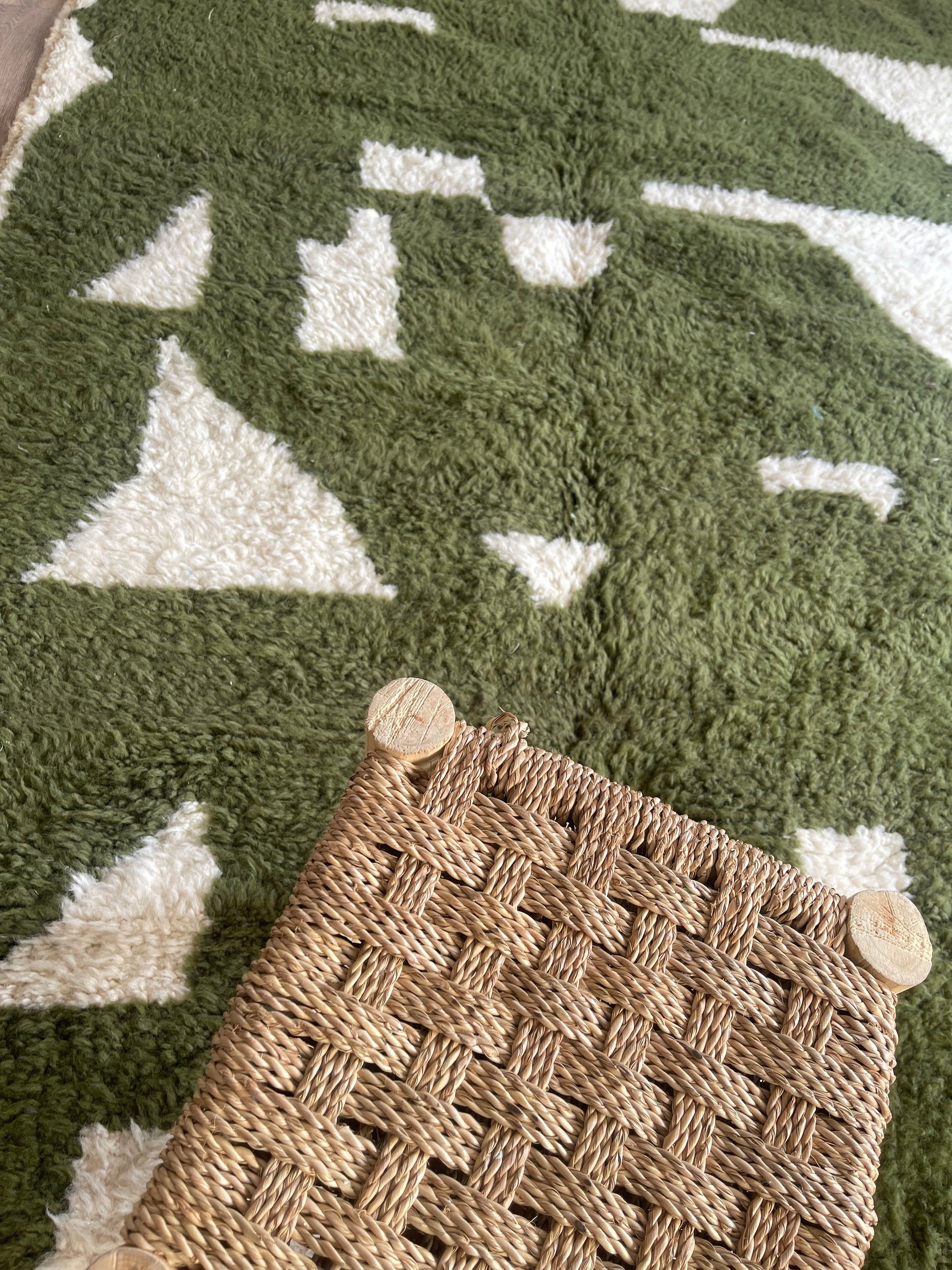 green rug living room